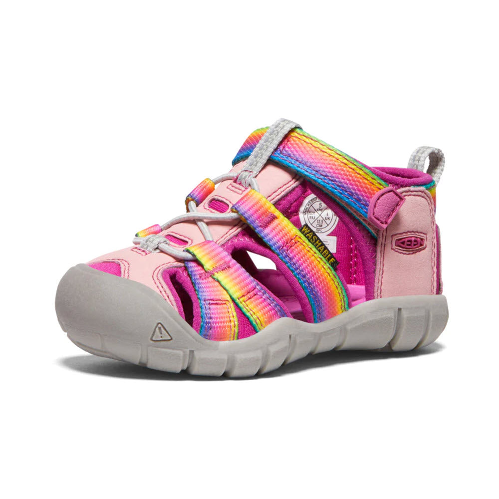 Child&#39;s Keen Seacamp II CNX Tots Rainbow water sandal with closed toe, displayed against a white background.