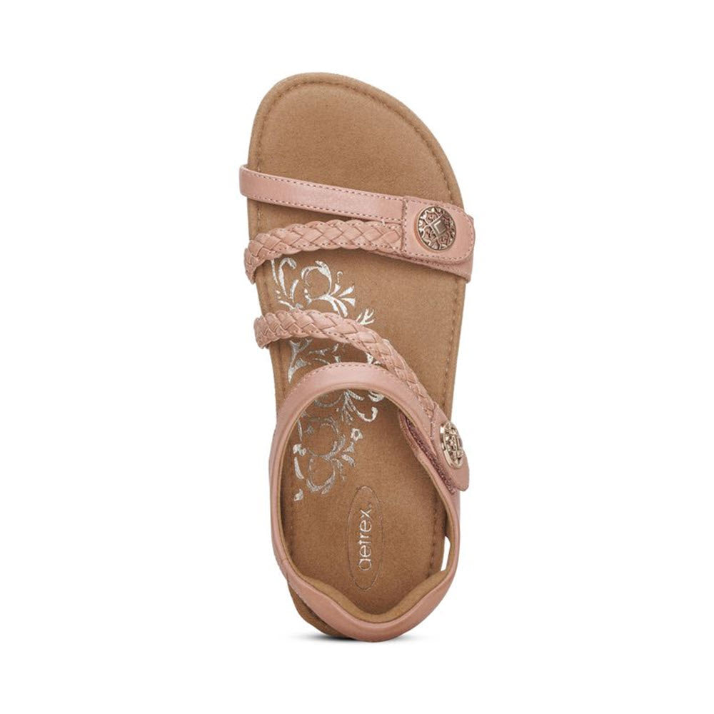 A single Aetrex Jillian Rose sandal with floral patterns and a circular logo on the strap, displayed against a white background.