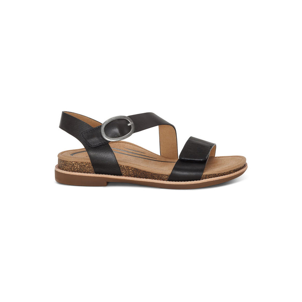 Aetrex Tamara black strappy sandal with a memory foam footbed and a flat sole, isolated on a white background.