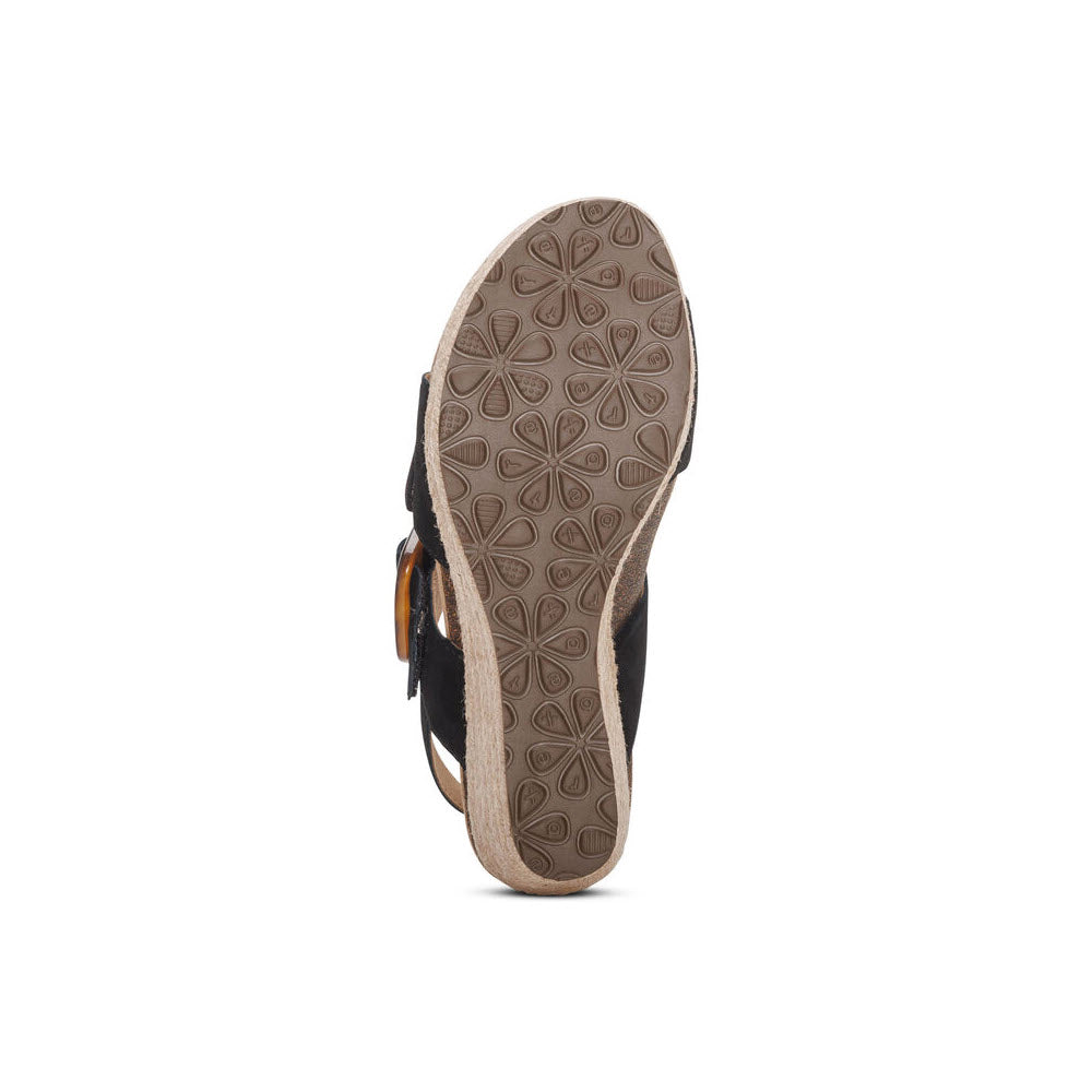 A single Aetrex Ashley Black - Womens hiking shoe with a prominent, detailed tread design and memory foam footbed, viewed from the back with a small visible portion of the heel.