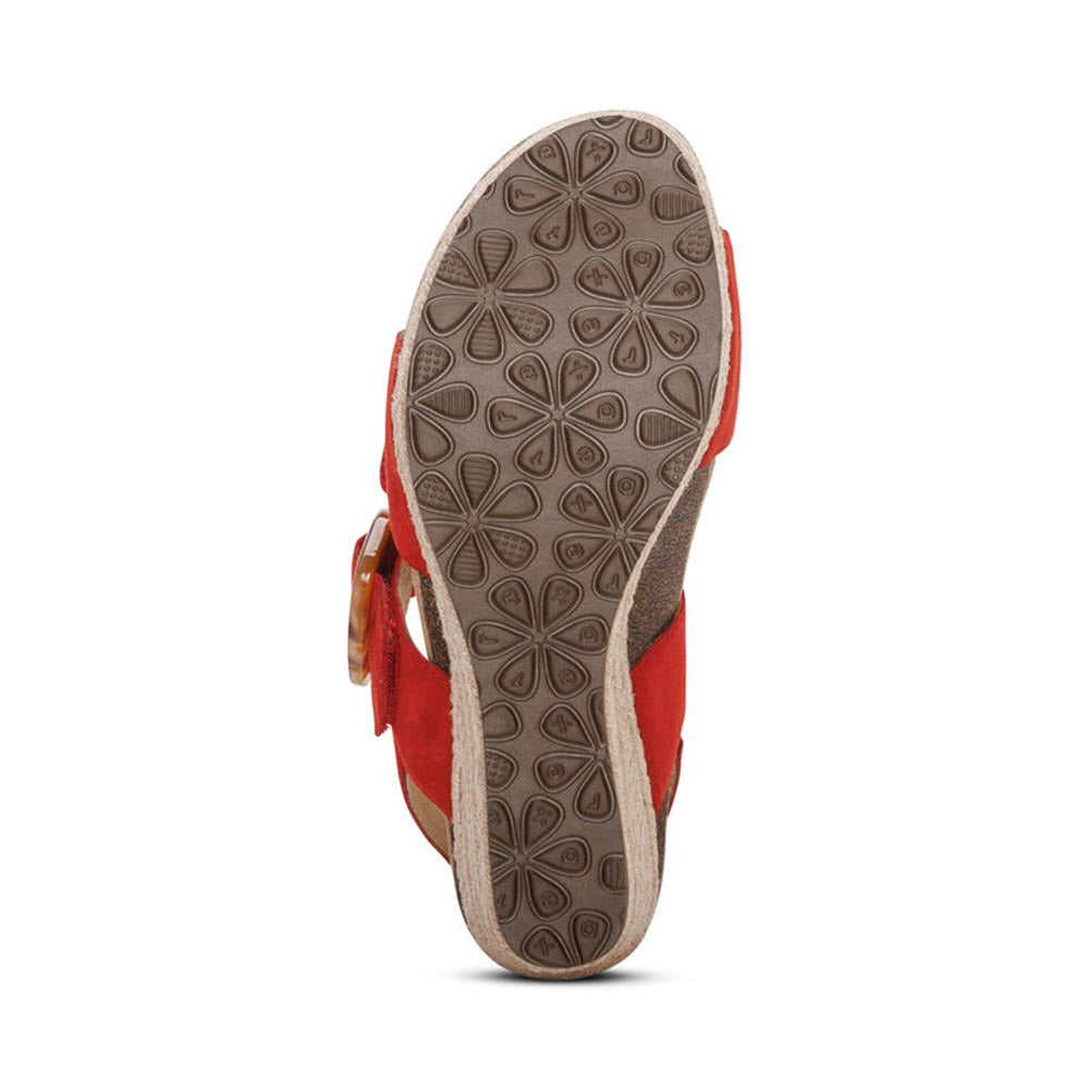 A single red shoe with suede texture and decorative laces, displayed sole facing forward showing a patterned tread design and arch support - Aetrex Ashley Poppy - Womens.