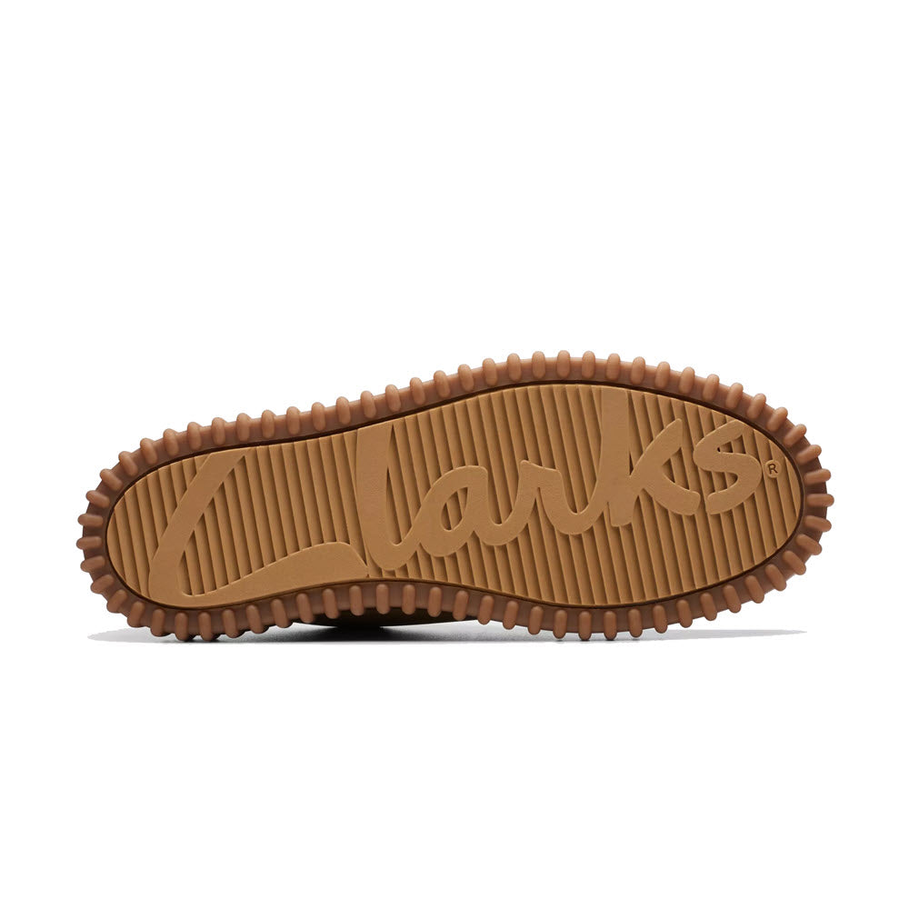 Sole of a Clarks Torhill Low Oxford shoe displaying the embossed brand name and ribbed outsole, set against a white background.