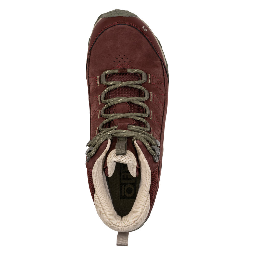 Top view of a OBOZ OUSEL MID B-DRY PORT - WOMENS sneaker with green laces, featuring a white toe and a logo on the insole by Oboz.
