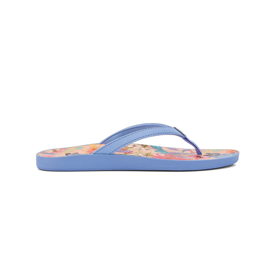A single blue floral Olukai Puawe Cloud Blue Floral sandal isolated on a white background.