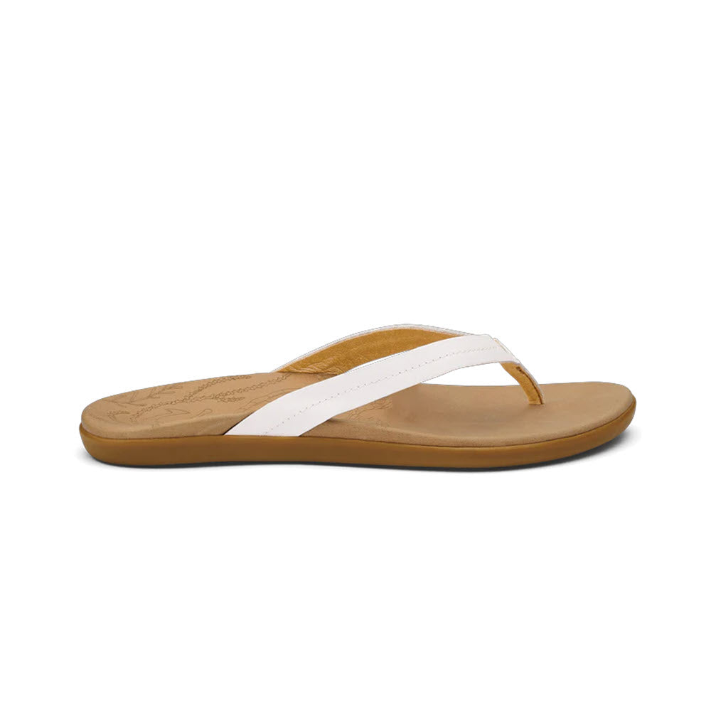A single Olukai Honu Bright White - Womens flip-flop with a leather footbed, viewed from the side against a white background.