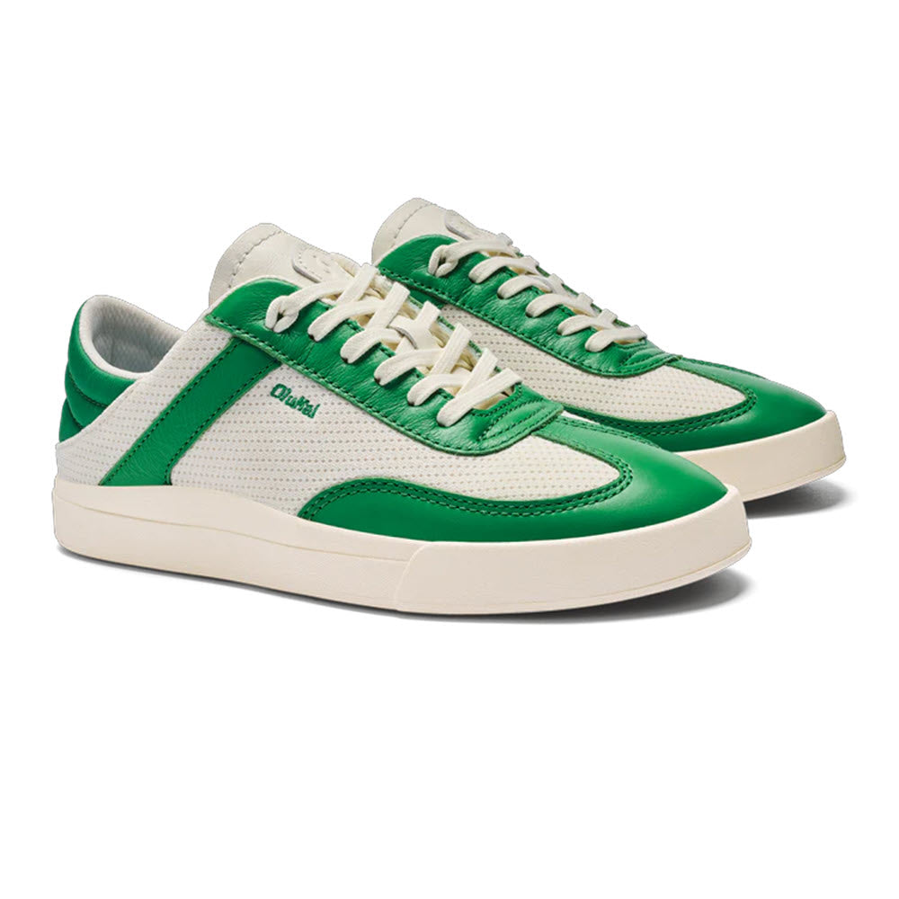 A pair of Olukai Kilea Off White Bamboo court sneakers with laces on a white background.