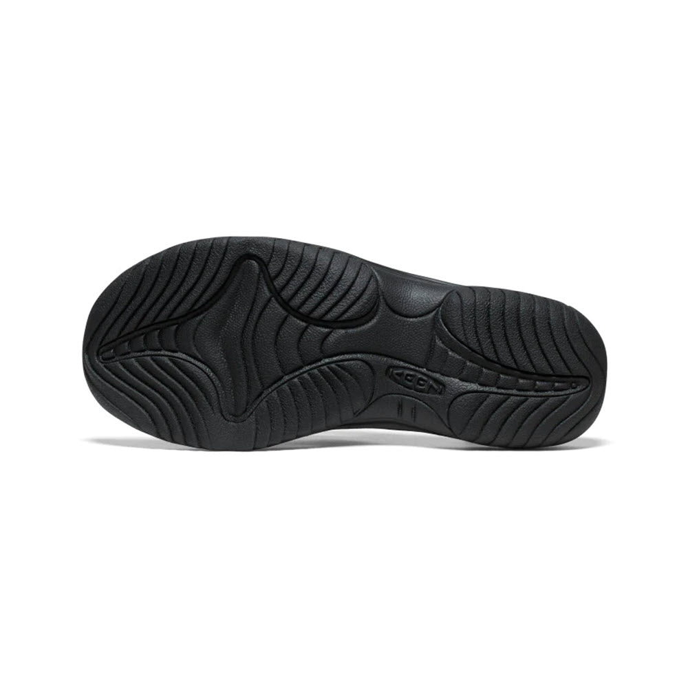 Keen Kona Flip TG shoe with a black rubber sole, textured patterns, arch support, and brand logo visible.
