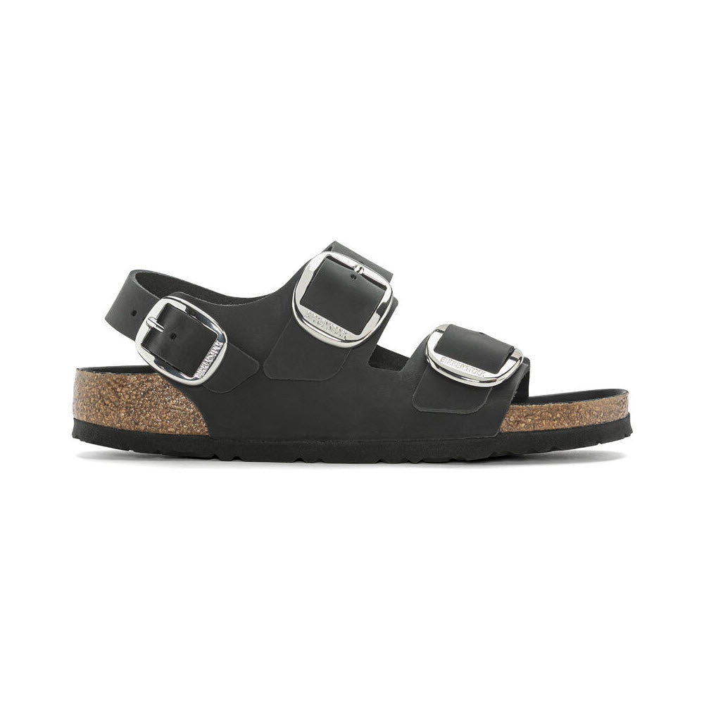 Birkenstock Milano Big Buckle Black sandals with adjustable big buckles and a cork sole, isolated on a white background.