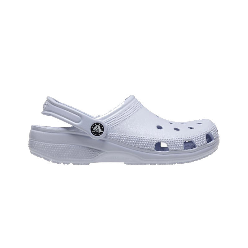 A white Crocs Classic Clog Dreamscape shoe displayed against a white background.