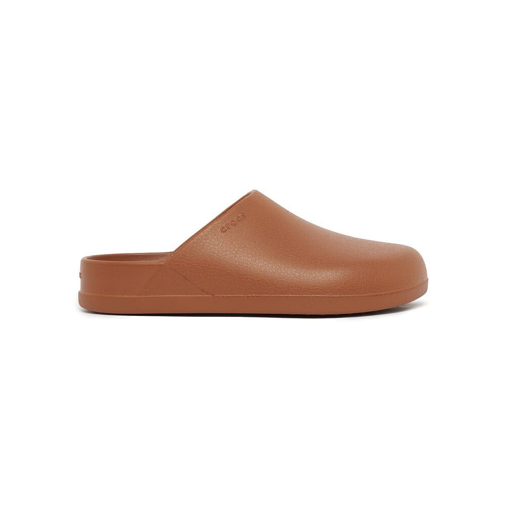 A single brown Crocs Dylan Clog Cognac slide sandal isolated on a white background.