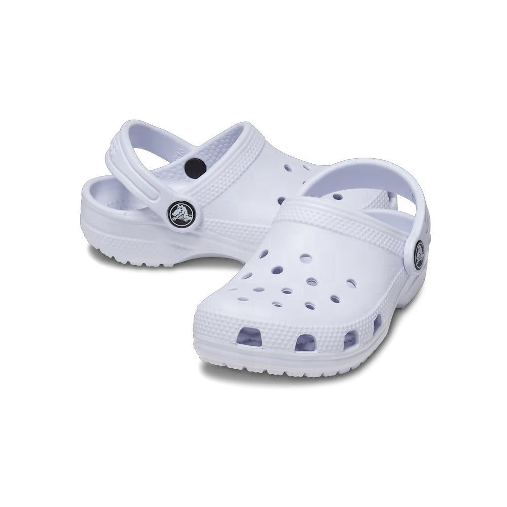 A pair of kids&#39; Crocs Classic Clog Dreamscape shoes on a white background.