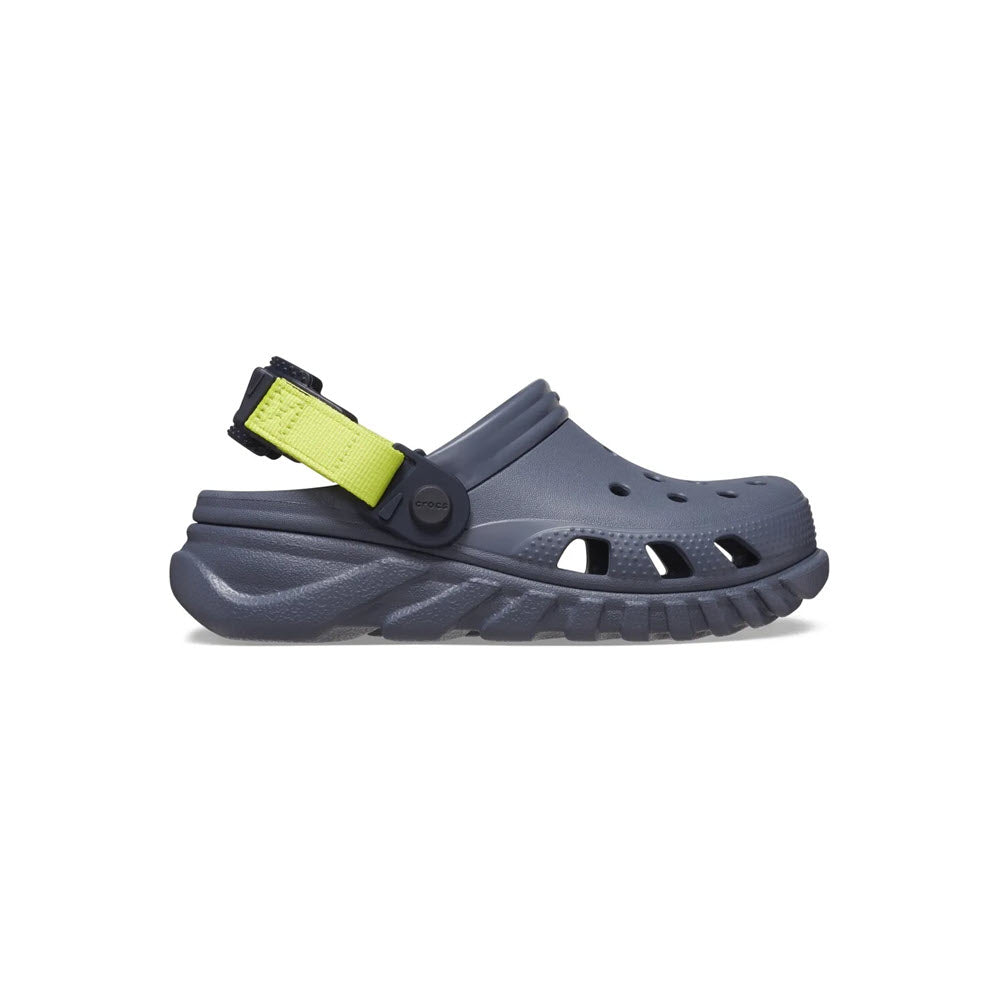 Gray Crocs Duet Max sandal with adjustable yellow strap detail on a white background. 
To
Gray CROCS DUET MAX CLOG STORM - KIDS sandal with adjustable yellow strap detail on a white background.