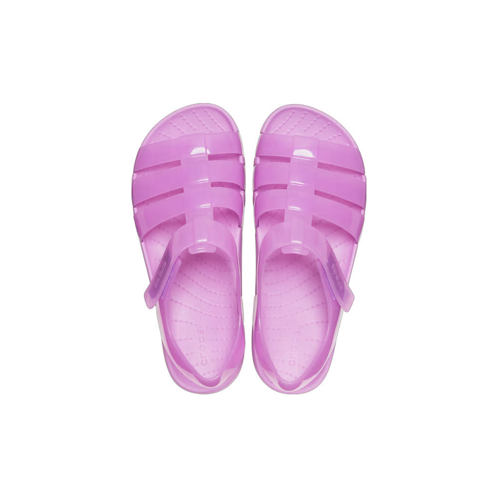 A pair of Crocs Isabella Jelly Bubble Kids sandals with glitter TPU straps positioned symmetrically on a white background.