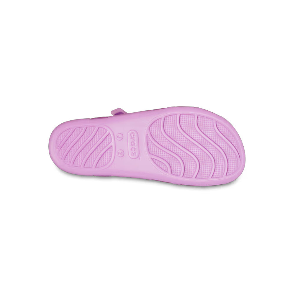 A single Crocs Isabella Jelly Bubble - Kids Sandal viewed from the bottom, displaying its tread pattern and Crocs brand logo.