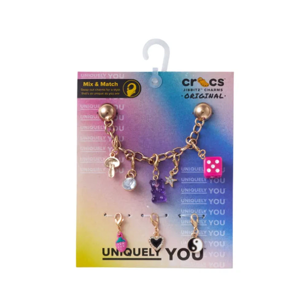 A Jibbitz Charm Chain for Crocs shoes, featuring various playful Jibbitz charms including a dice and flip-flop, displayed on a colorful &quot;uniquely you&quot; card.