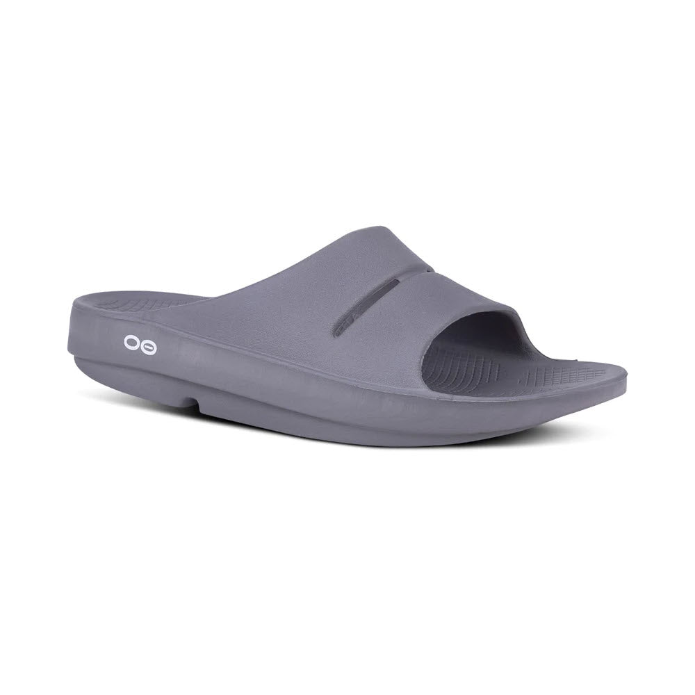 A single gray slide sandal featuring OOFOS OOAHH SLATE - MENS technology, with a thick sole and a textured footbed, isolated on a white background.