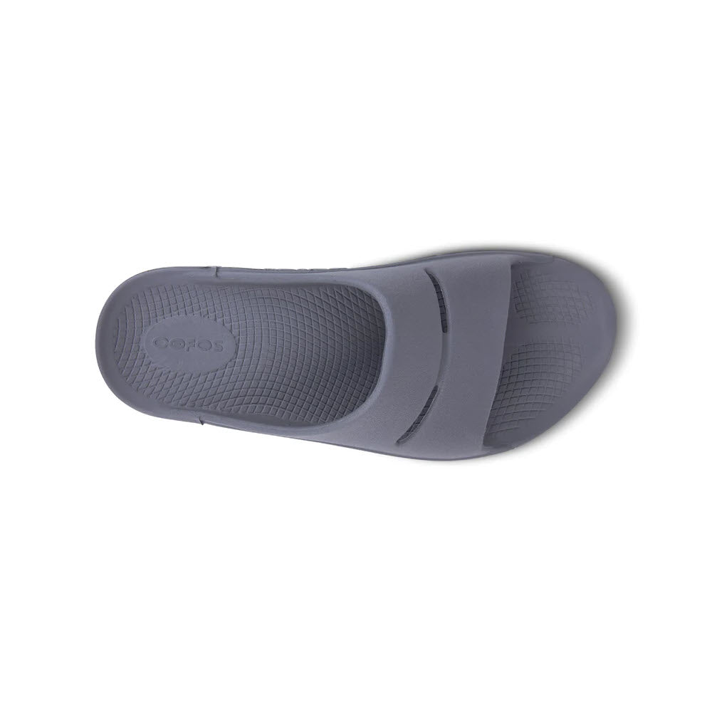 Top-down view of a single Oofos Ooahh Slate - Mens slide sandal isolated on a white background.
