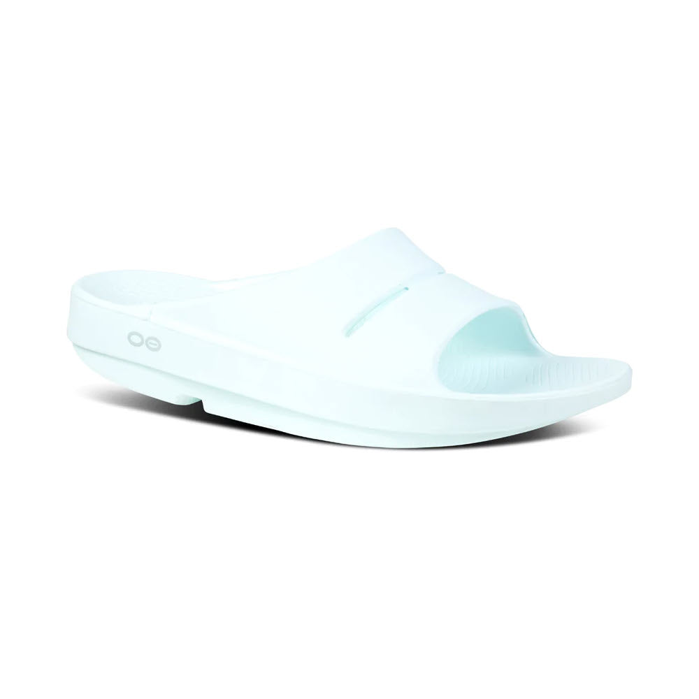 Men&#39;s white slide sandal with a thick sole featuring OOfoam technology from Oofos, isolated on a white background.