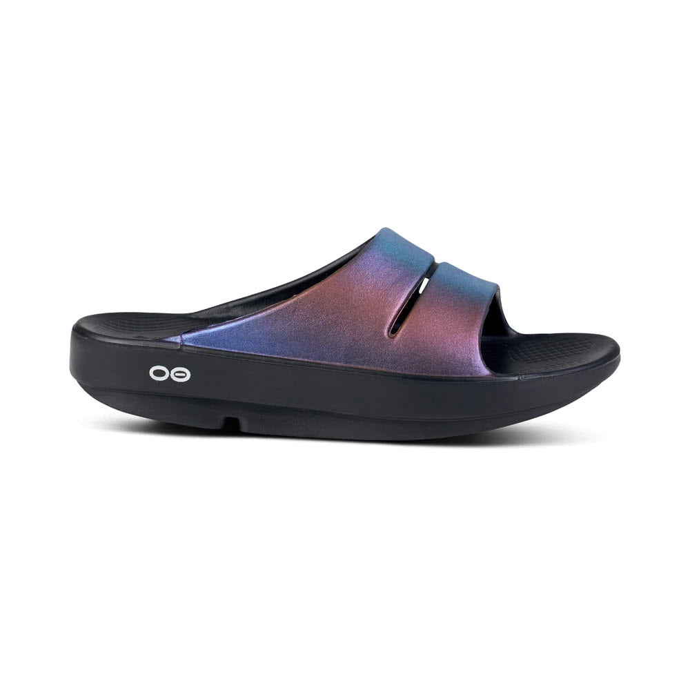 A single Oofos Ooahh Luxe Midnight Spectre slide sandal with a streamlined footbed, featuring a minimalist design and the Oofos logo on the side.