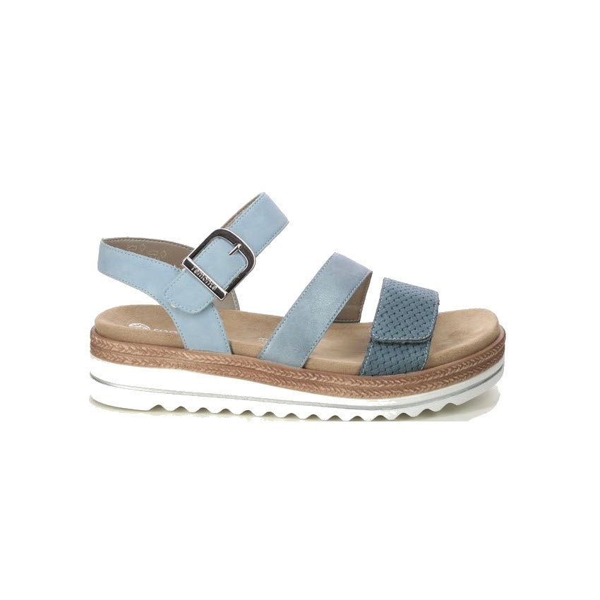 A light blue strappy Remonte City Walker Gladiator sandal with a buckle, featuring a multilayered sole with shock-absorbing properties and textured details on a white background.