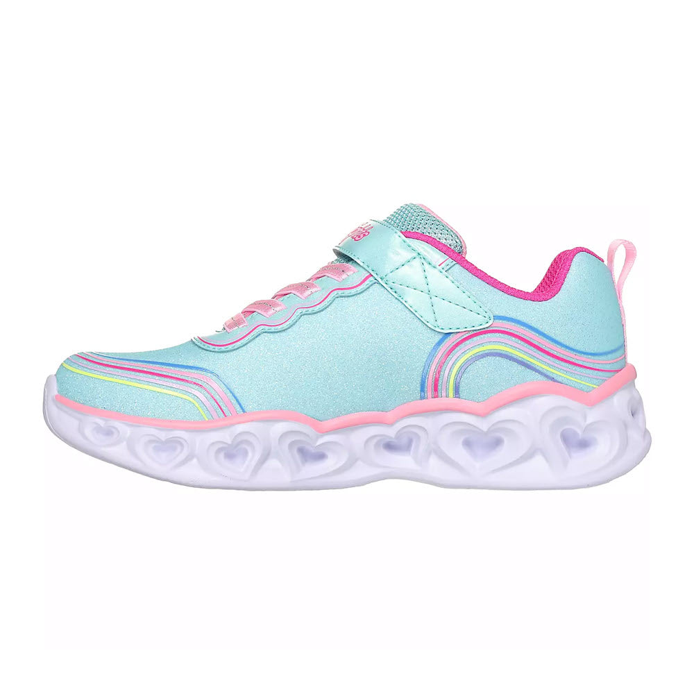 A colorful children&#39;s sneaker with a shimmering blue upper, pink accents, rainbow heart print detailing, and a chunky white sole - Skechers Heart Lights Retro Hearts Turquoise Multi.