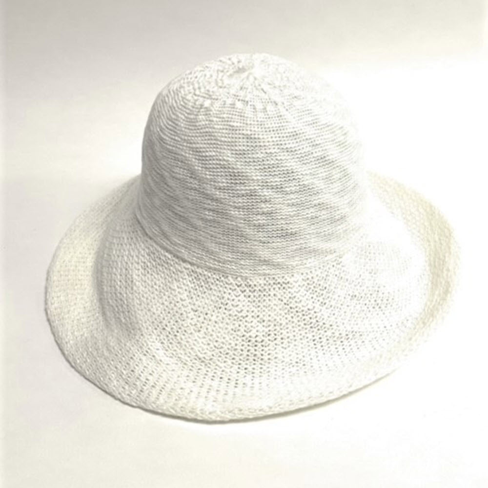 White SHIHREEN LARGE TURNUP BRIM HAT CREAM with an adjustable band on a plain background by Shihreen Inc.