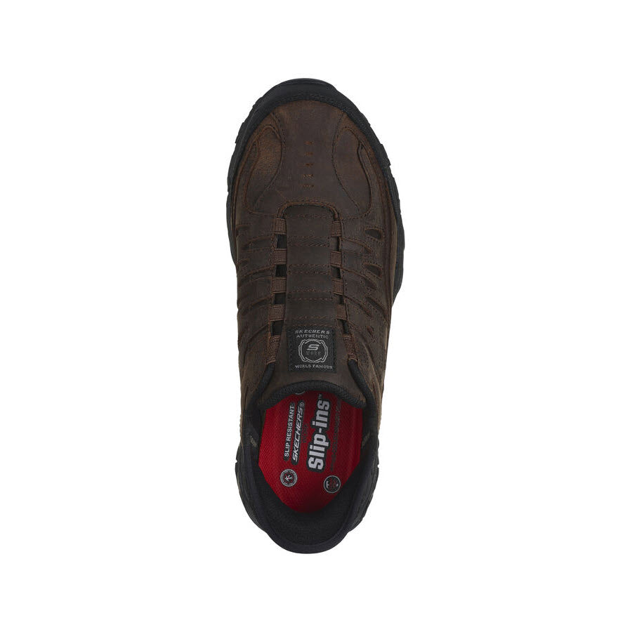Top view of a single brown leather men&#39;s Skechers shoe with red interior and a visible Skechers brand label.