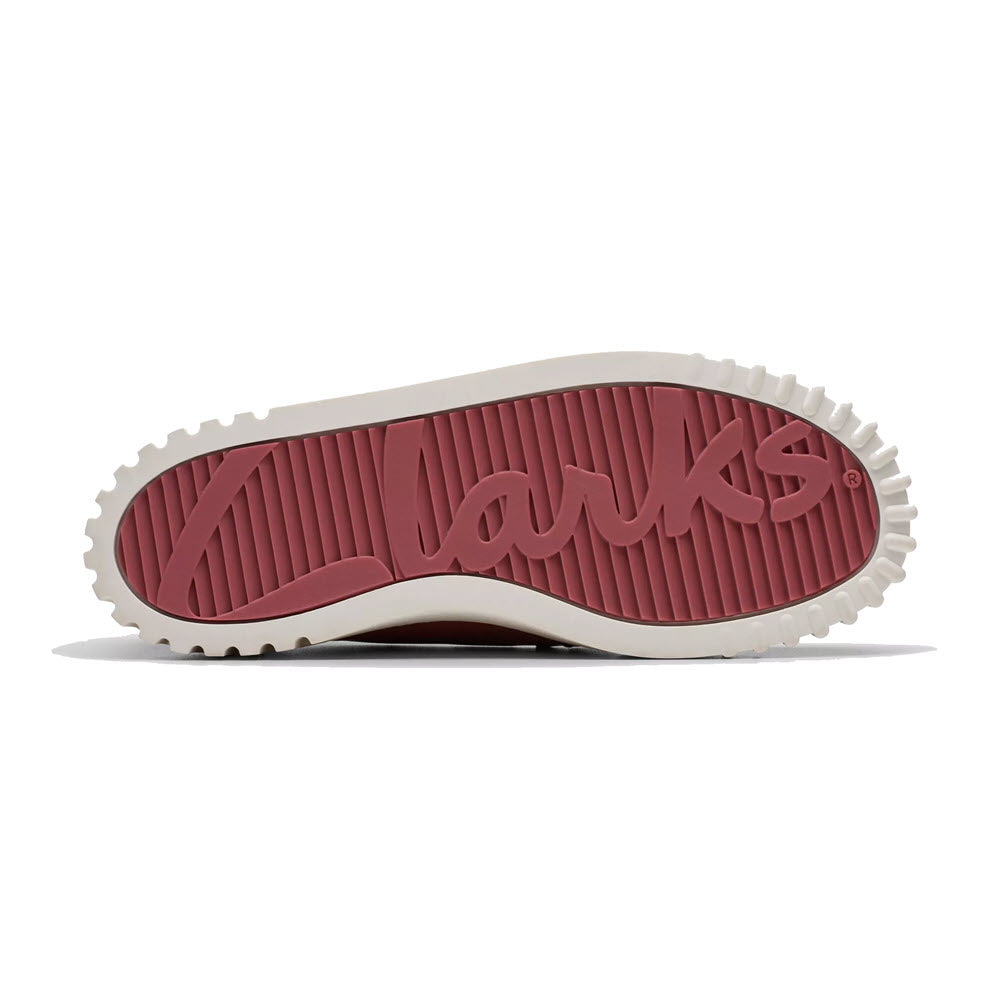 Sole of a Clarks Mayhill Cove Dusty Rose Nubuck - Womens shoe displaying the Clarks logo embossed in a tread pattern, with a maroon and beige color scheme featuring a Contour Cushion footbed.