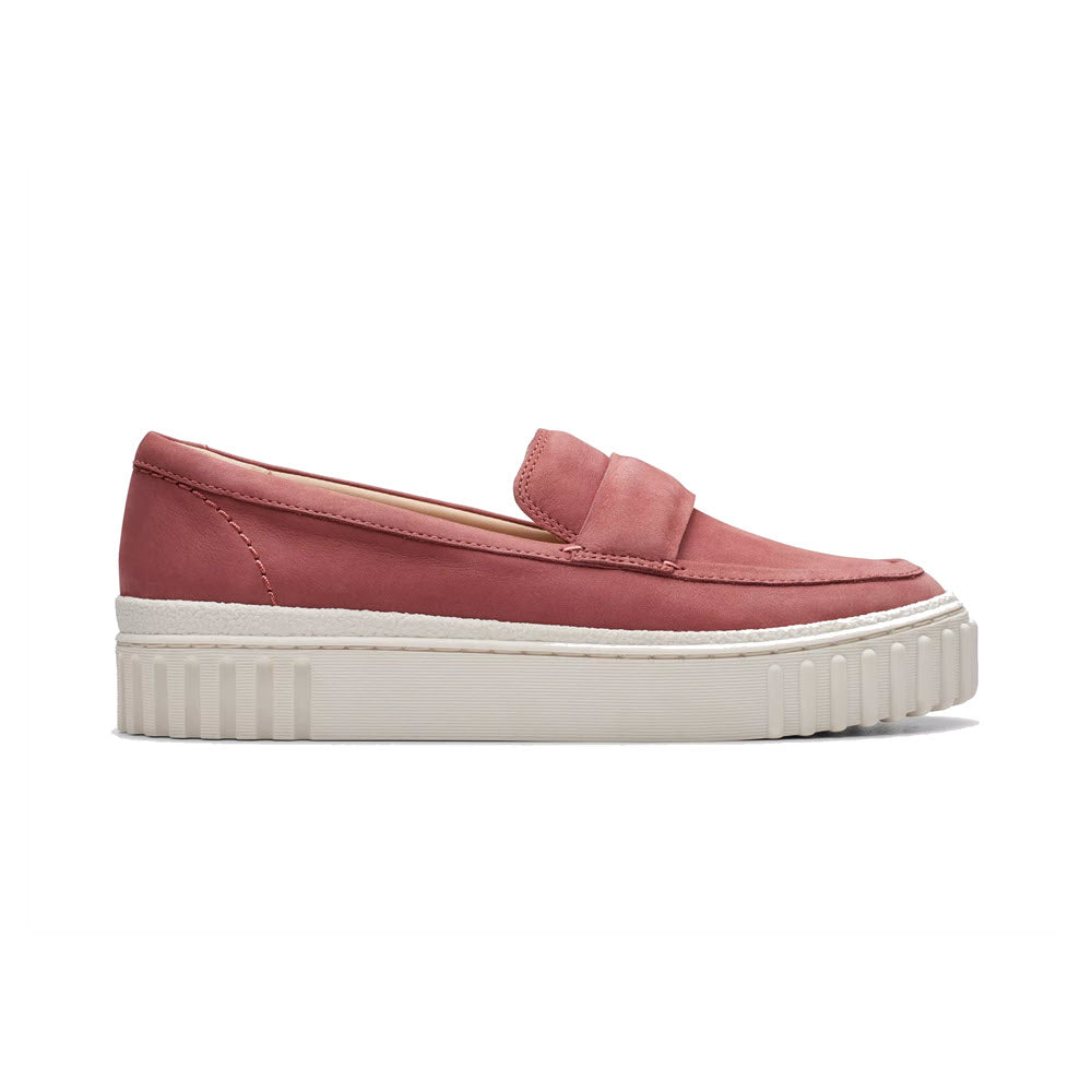 A Clarks Mayhill Cove dusty rose nubuck leather platform loafer with a white rubber sole and a strap across the top.
