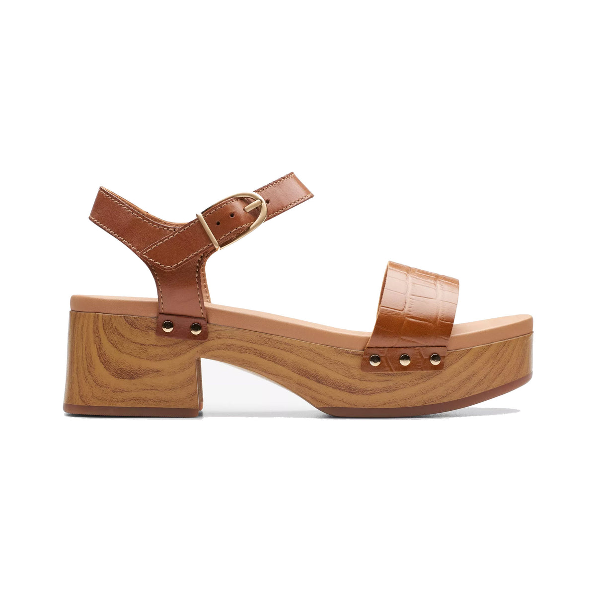 A Clarks Sivanne Walk Tan sandal with a thick wooden platform sole and a flared heel, featuring a strap around the ankle, photographed against a white background.