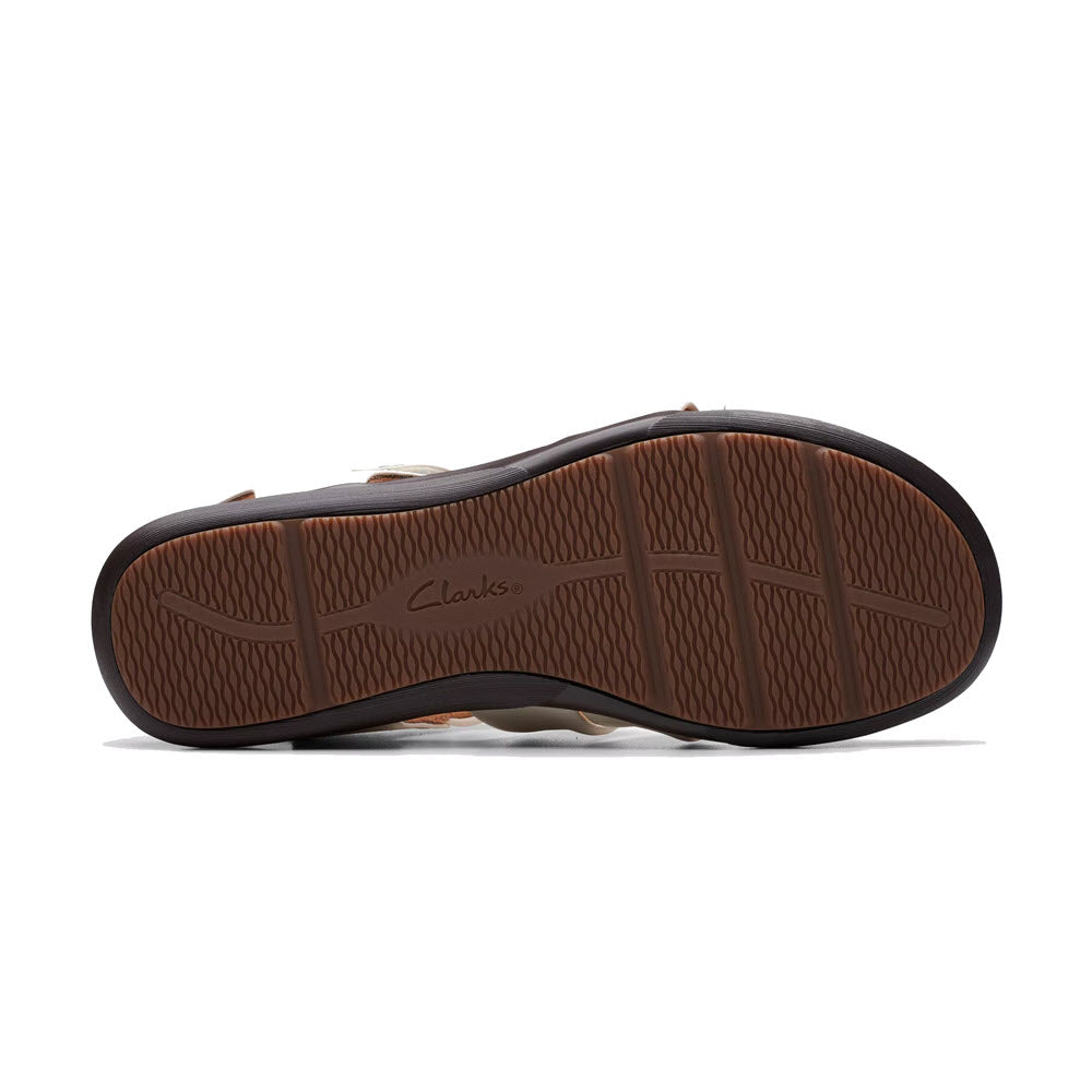 A sole of a Clarks Kitly Ave sandal showing the tread pattern and branding.
