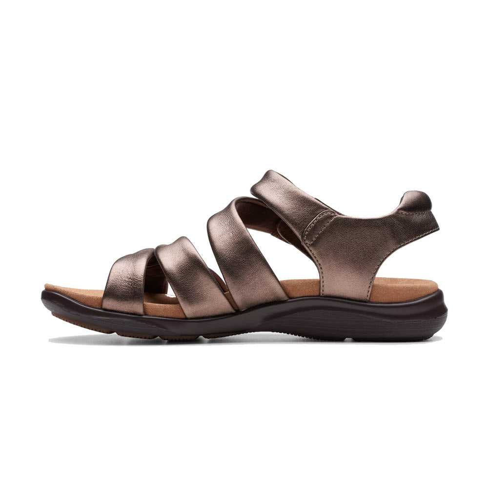 A single Clarks Kitly Ave Bronze sandal with an open-toe profile, displayed on a white background.