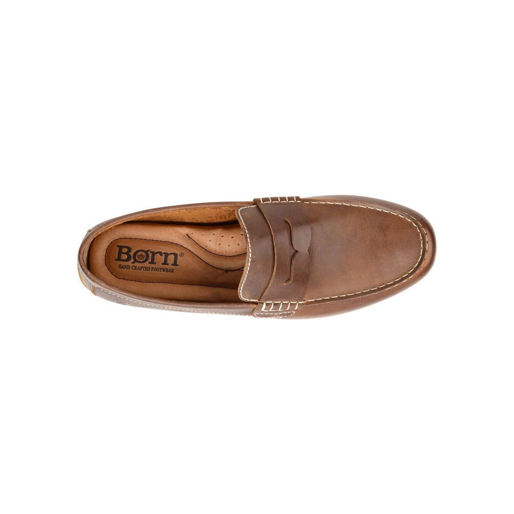 A single brown full-grain leather Born Andes slip-on penny loafer shoe displayed on a white background, featuring a slip-on design with stitching details.