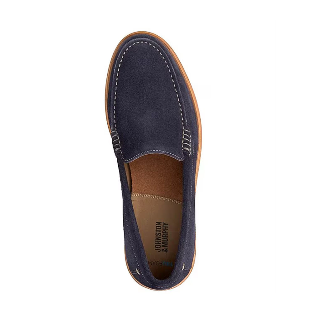 Top view of a single Johnston &amp; Murphy Lyles Venetian Slip On navy suede loafer with contrast stitching and tan leather interior on a white background.
