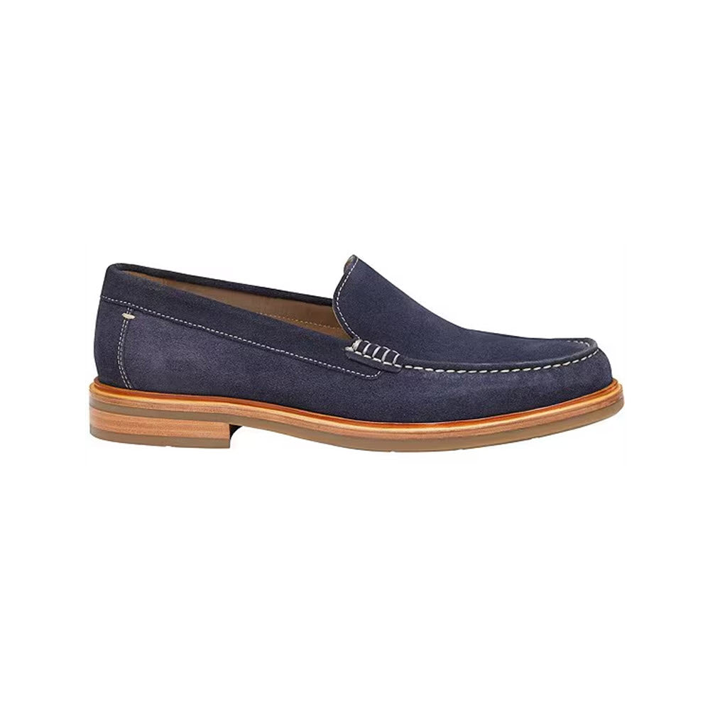 Johnston &amp; Murphy navy blue brushed suede men&#39;s loafer with white stitching on a plain background.