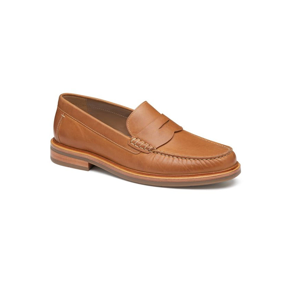 A single Johnston & Murphy Lyles slip on penny tan full grain loafer with moc toe, detailed stitching, and a layered sole, displayed against a white background.