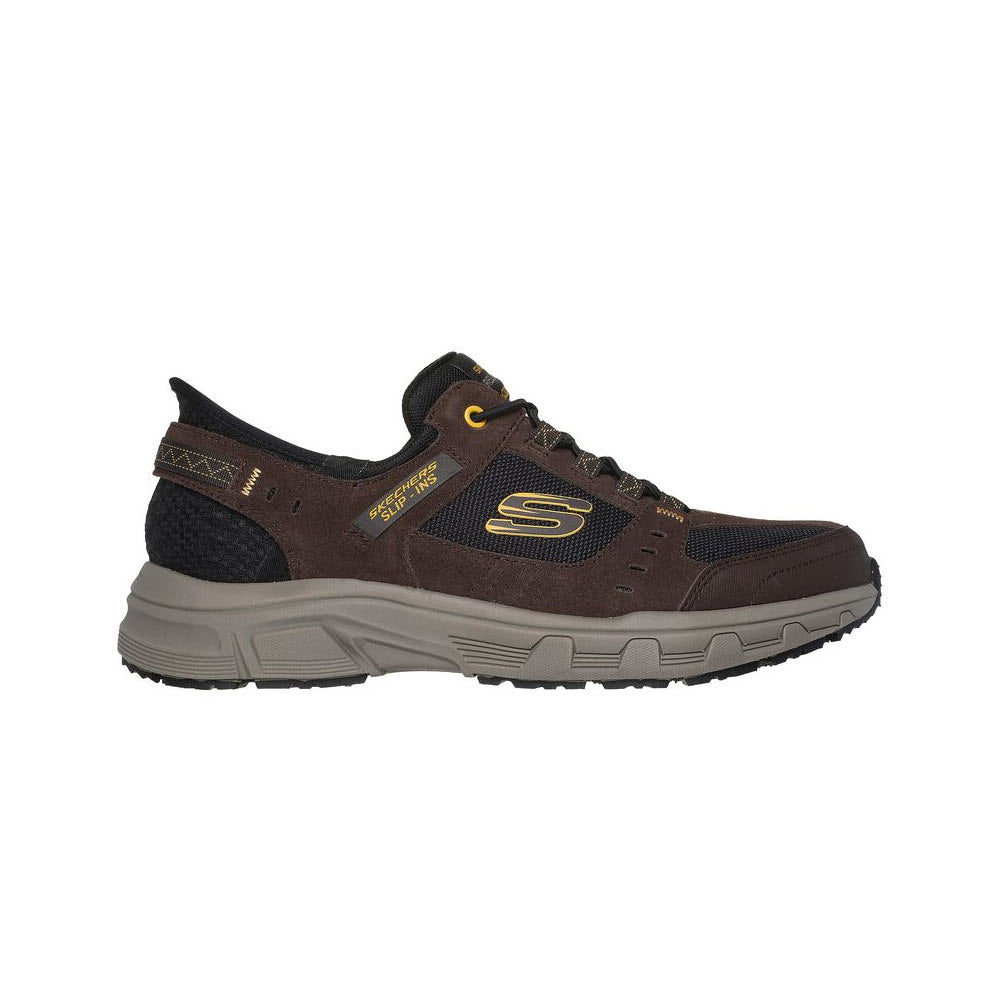 Brown Skechers Slip-Ins Oak Canyon outdoor trail shoe featuring a lace-up design, Air-Cooled Memory Foam cushioned sole, and durable traction outsole, isolated on a white background.