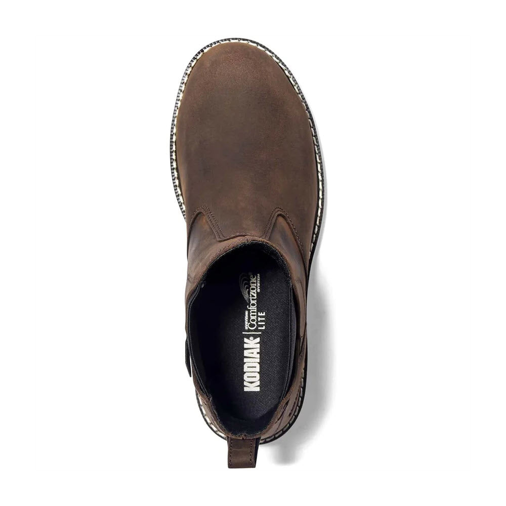 Top view of a single Kodiak Whitten Chelsea Wedge Boot in Dark Brown leather with a slip-resistant outsole and visible brand label inside.