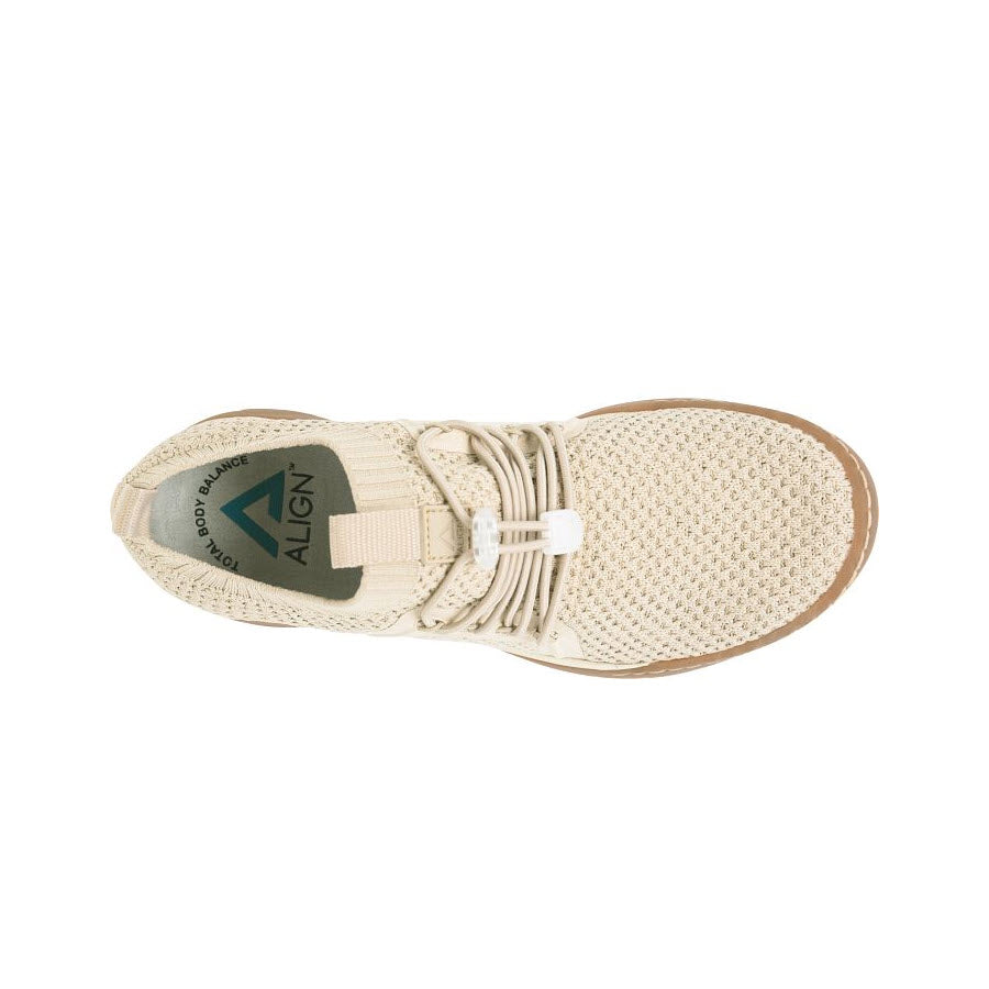 Top view of an Align Torri Beige sneaker with laces, featuring a black logo on the tongue and a slip-resistant outsole.