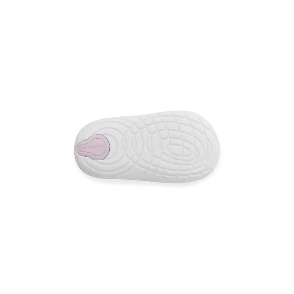 White oval-shaped memory foam orthotic shoe insole with a pink logo on the heel, isolated on a white background. - Stride Rite SM Jazzy Purple Multi-Kids