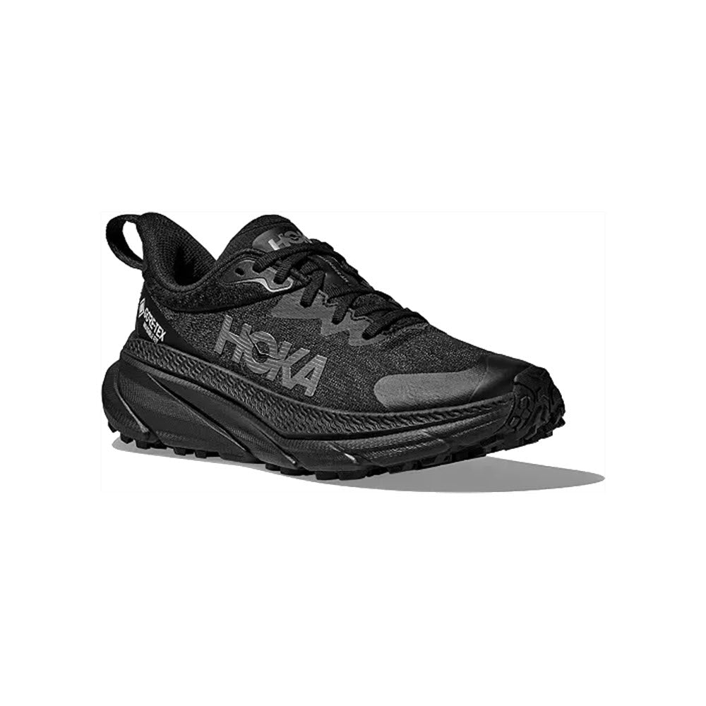 A single black HOKA CHALLENGER ATR 7 GTX running shoe displayed on a white background, showing the side view with prominent Hoka logos.