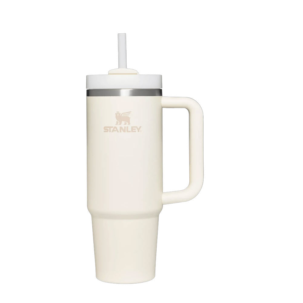 Cream 30 oz Stanley insulated mug with a handle and FlowState™ lid on a plain background.