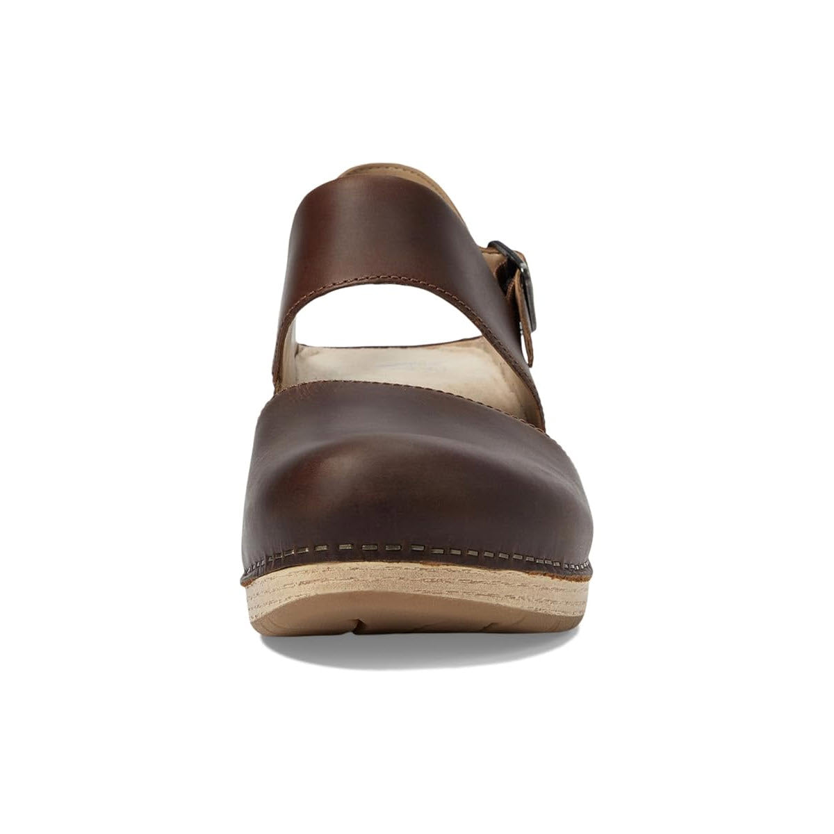 A brown leather clog with a closed toe and an adjustable heel strap, viewed from the front, set against a white background. Product Name: Dansko Lucia Tan - Womens