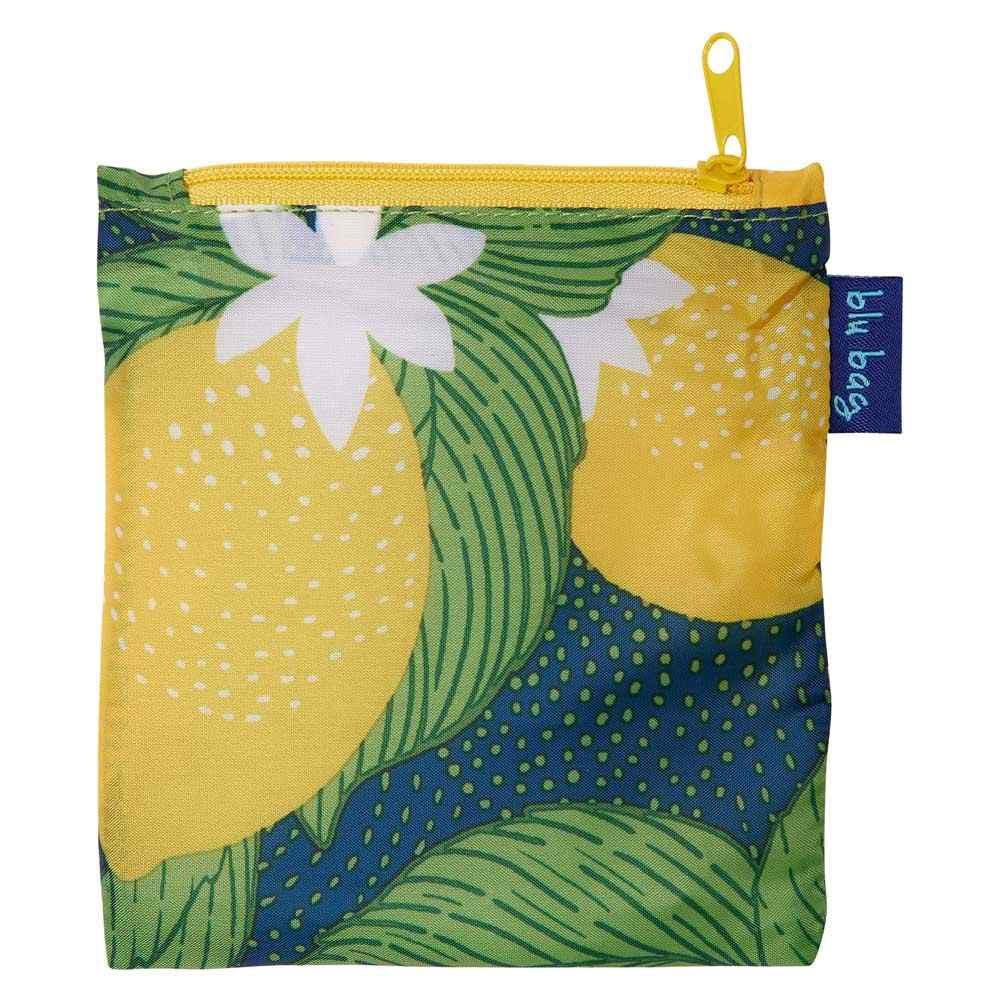 Fabric pouch with a tropical print featuring yellow lemons, green leaves, and white flowers, complete with a yellow zipper and a BLU BAG VINTAGE LEMONS tag on the side from Rockflowerpaper.