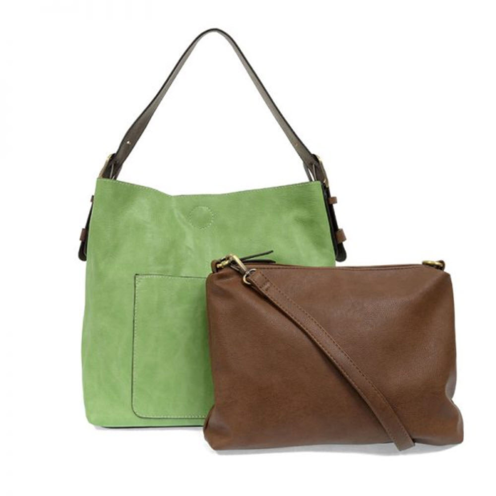 A Joy Susan hobo bag spring green with a large front pocket and a brown clutch with gold zippers on a white background.