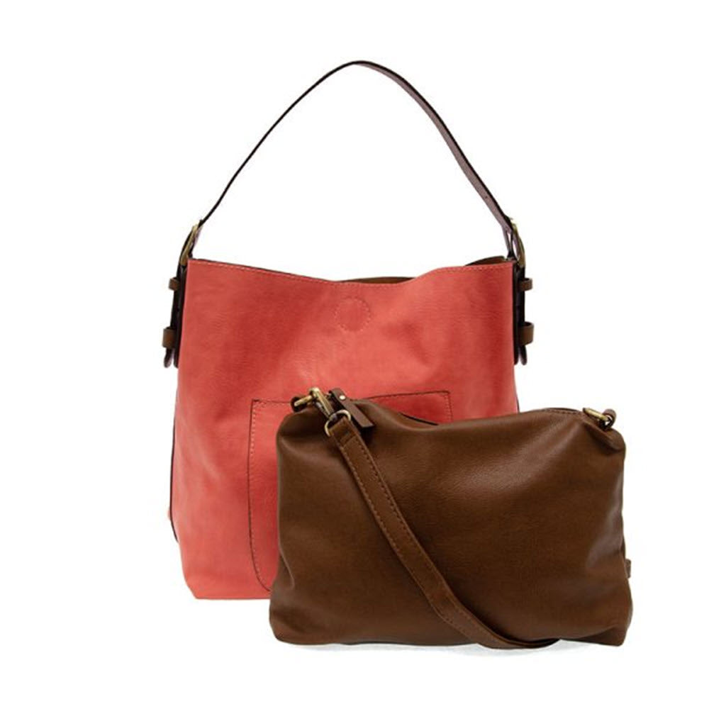 Two Joy Susan hobo bags, one large living coral roomy bag and one small brown crossbody bag, isolated on a white background.
