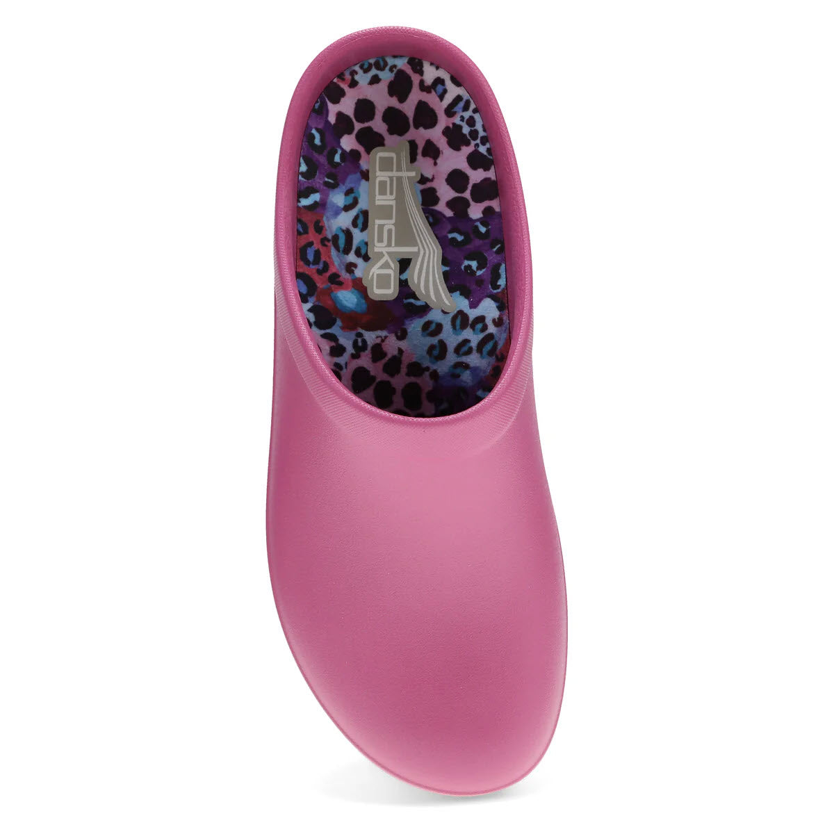 Sentence with the product replaced: Dansko Kaci Fuchsia slip-on shoe with a colorful leopard print insole, featuring lightweight bio-based EVA for all-day comfort, displayed against a white background.