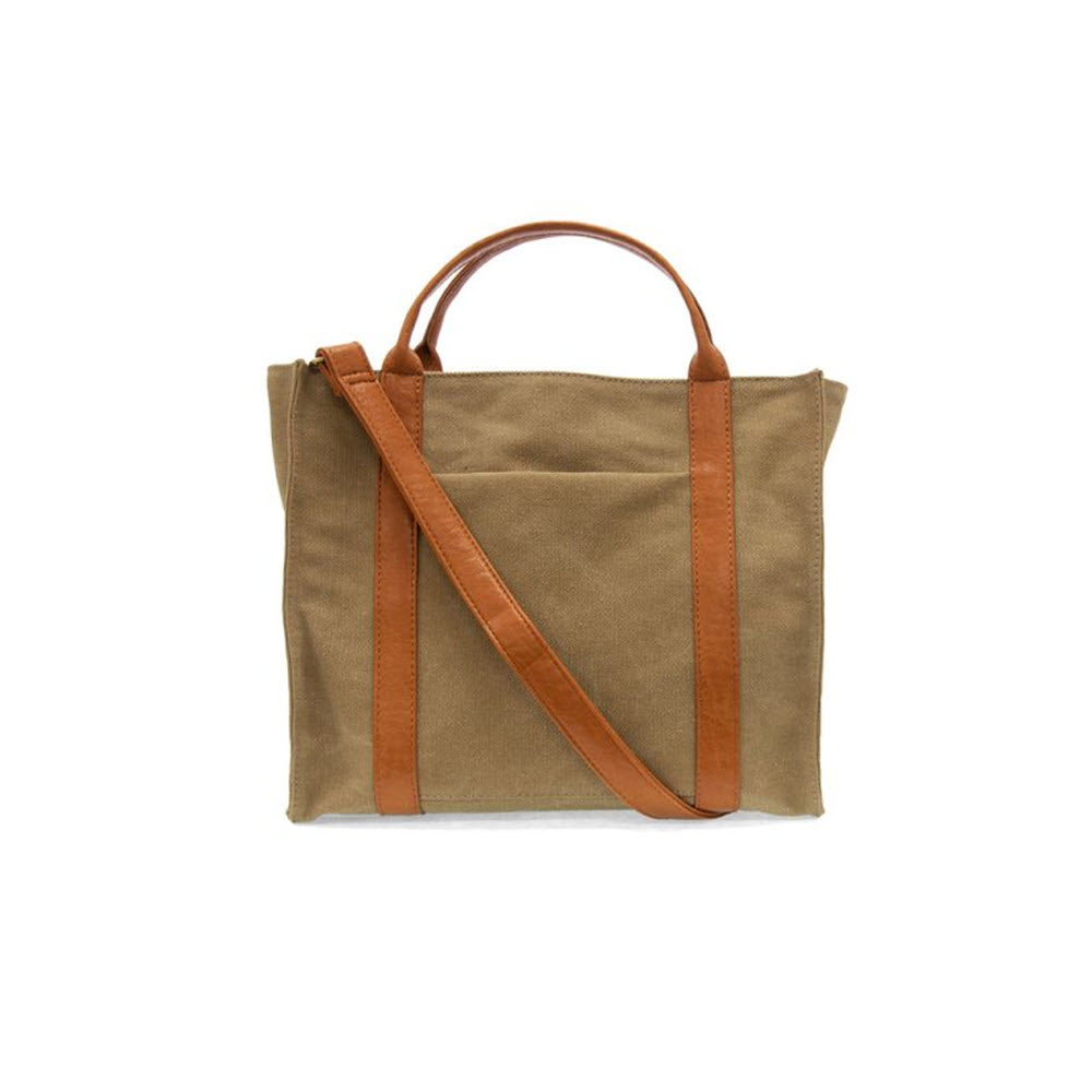 JOY SUSAN TONI LARGE CANVAS TOTE KHAKI with brown vegan leather handles and a crossbody shoulder strap, isolated on a white background.