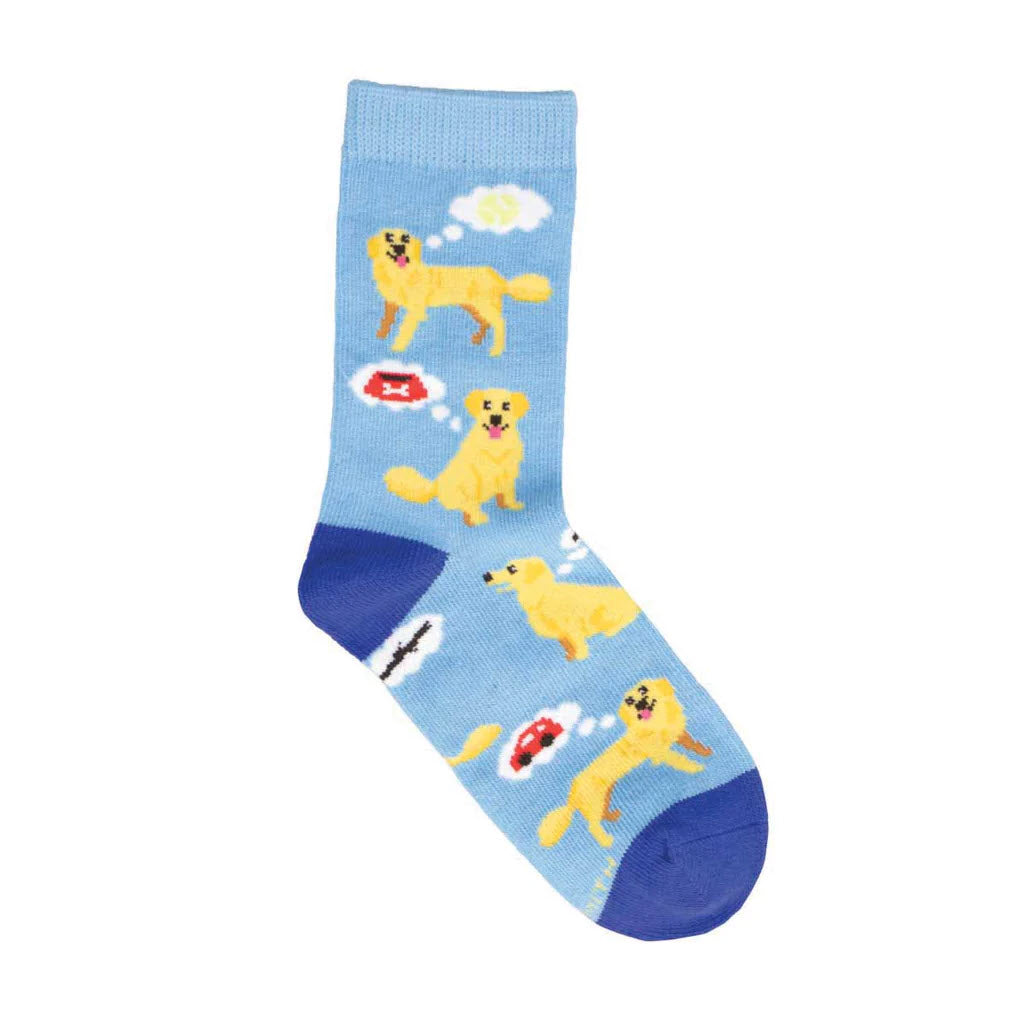 Blue Socksmith Doggy Thoughts Crew Socks with cartoon yellow dogs in various hilarious adventures, featuring medical and aviation symbols on a white cloud background.