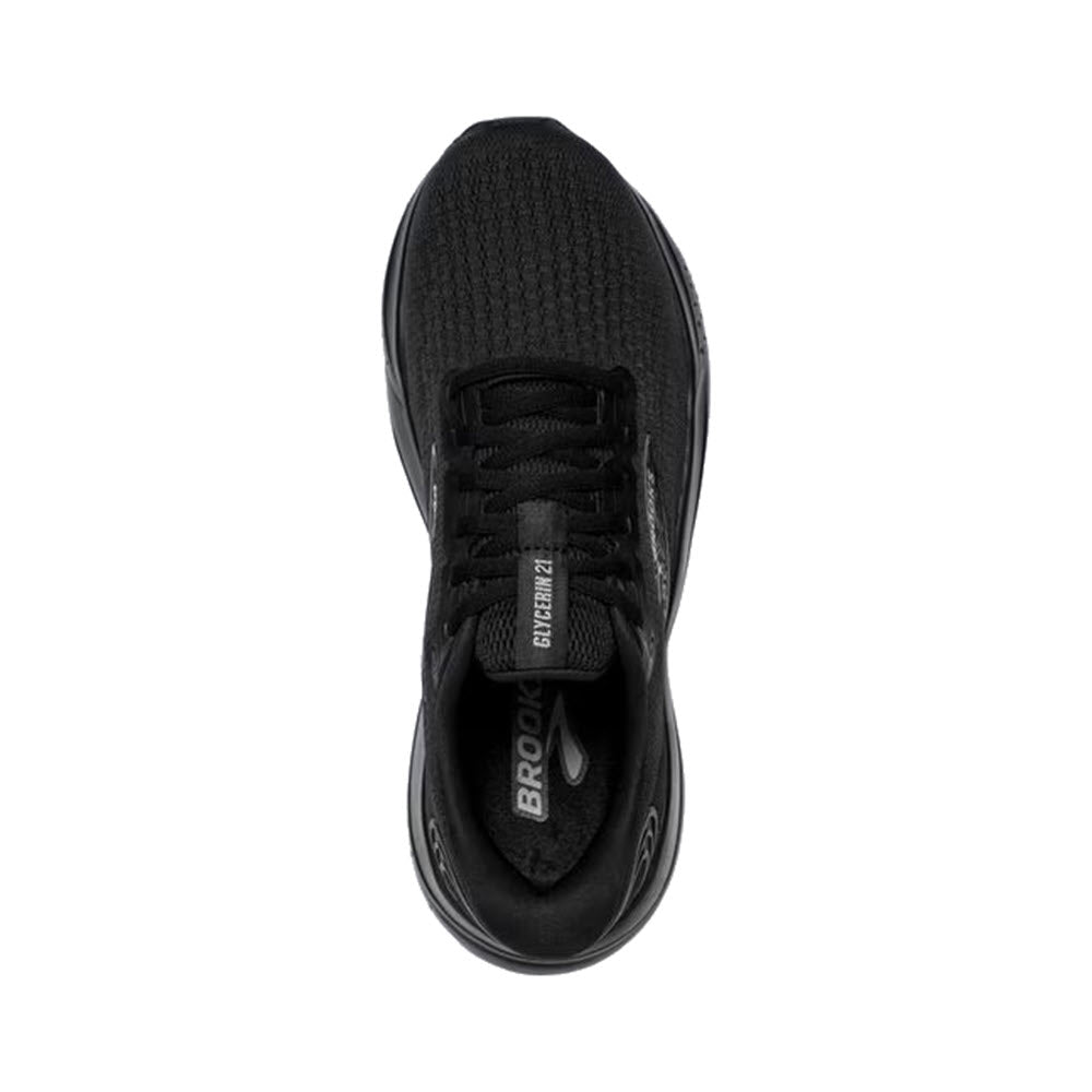 Top view of a pair of black Brooks Glycerin 21 women&#39;s running shoes with laces tied, isolated on a white background.